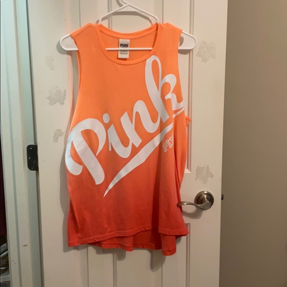 Orange tank top.